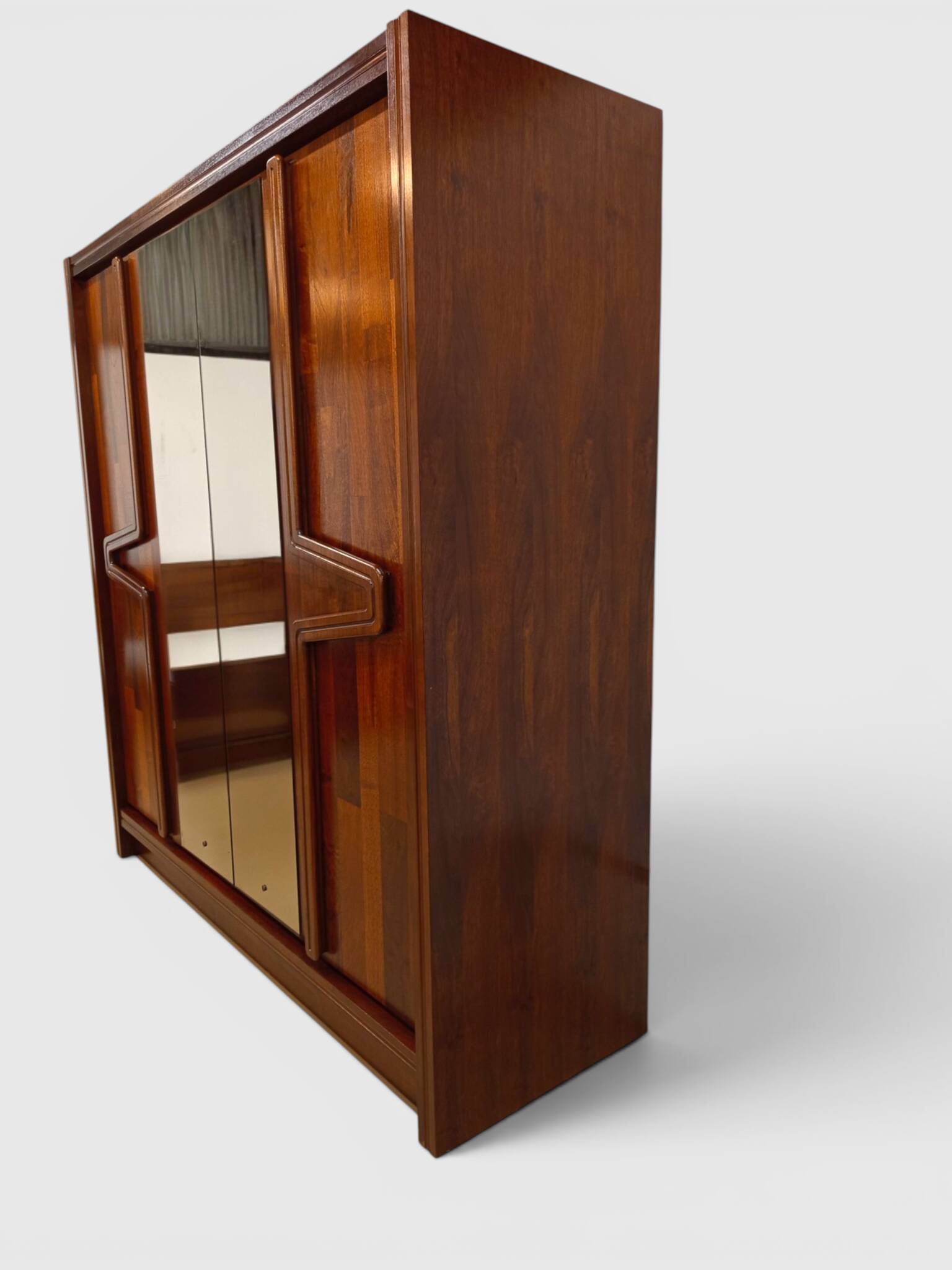 Modernist mahogany wardrobe with smoked mirrors (late 1970s)