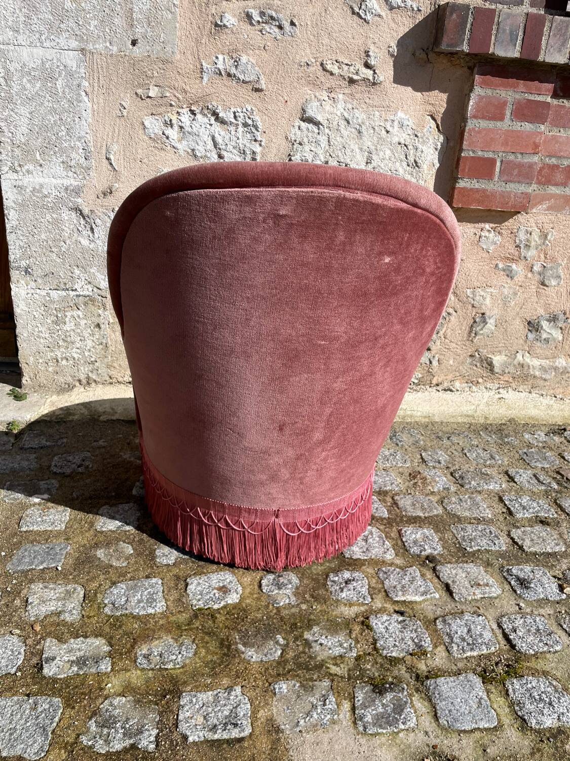Pink velvet armchair