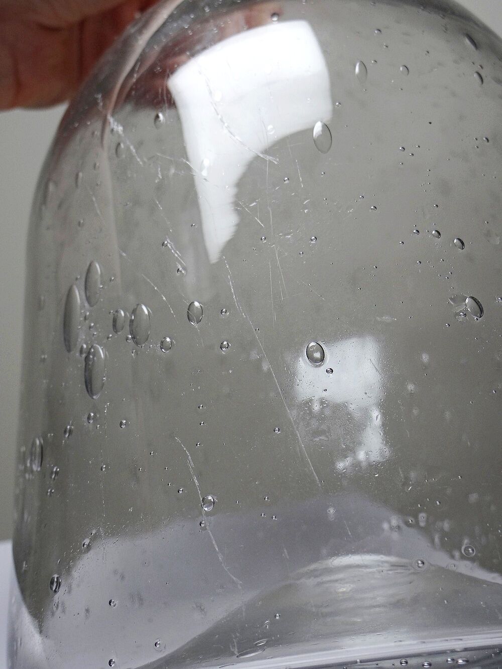 Large antique blown glass bottle with bubbles, early 20th century 1900-1920.