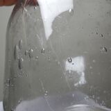 Large antique blown glass bottle with bubbles, early 20th century 1900-1920.