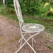 Foldable medallion garden chair from the 20th century in wrought iron with Heart motifs