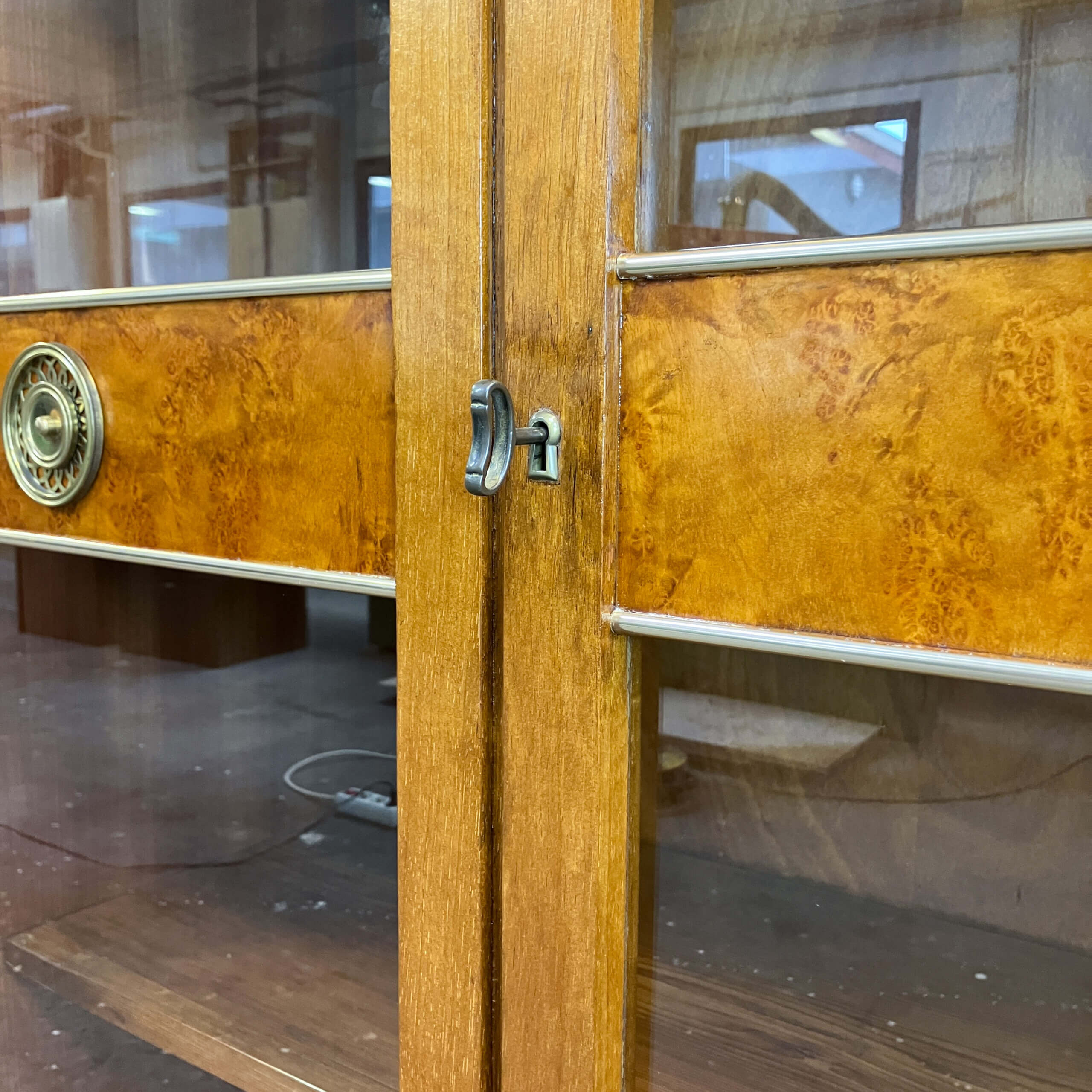 Art Deco cabinet with glass doors, various woods, 1930s