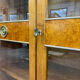 Art Deco cabinet with glass doors, various woods, 1930s