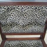 Old leopard fabrics armchair