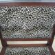 Old leopard fabrics armchair