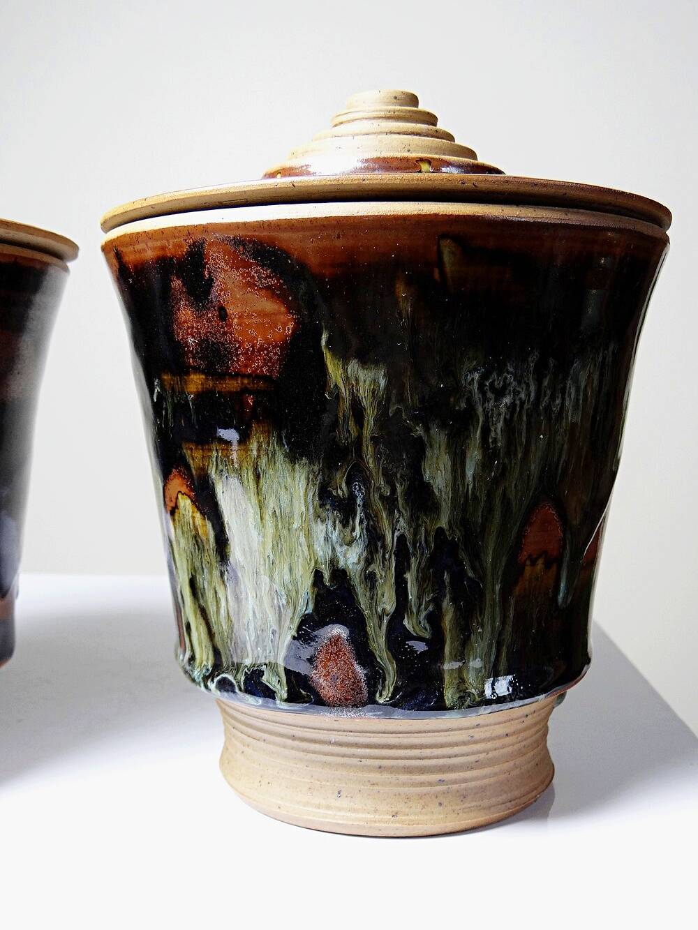 A pair of vintage stoneware pots from the 80s-90s with a Japanese style, signed handmade pottery.