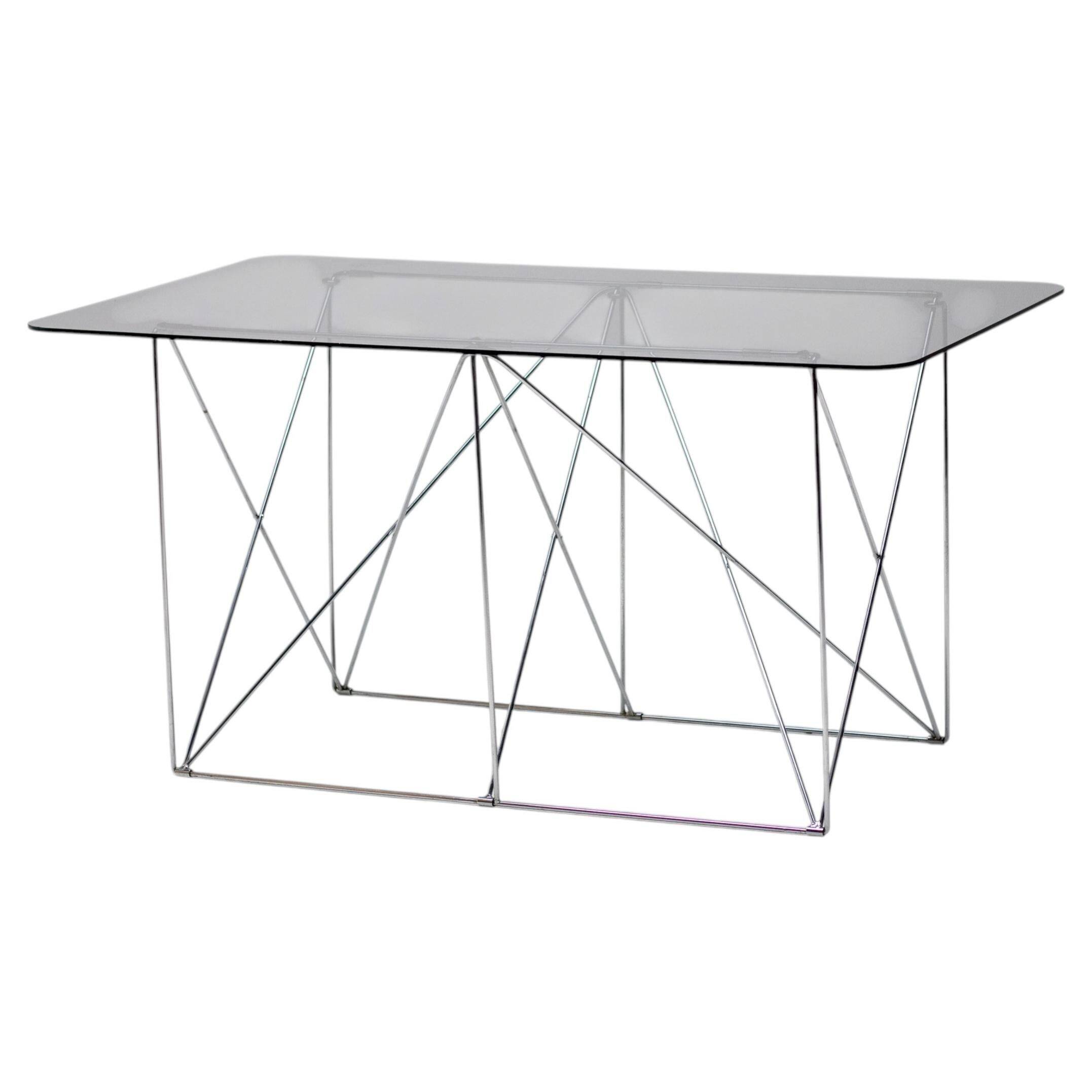 Table de salle à manger pliante en verre fumé Max Sauze - Un chef-d'œuvre de design minimaliste