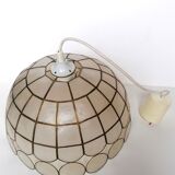 Mother-of-pearl and brass suspension