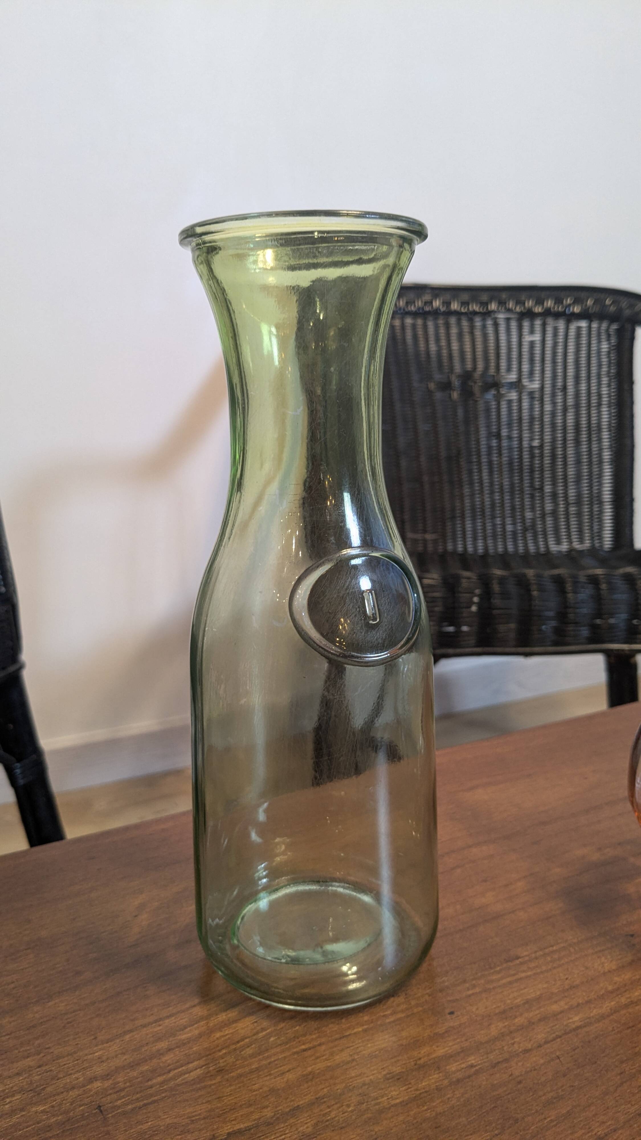 Old green milk bottle