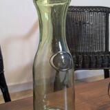 Old green milk bottle