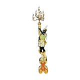 Early XXth era polychrome wooden torch has figuration of a Moor in traditional costume from the 18th
