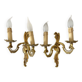 Pair of golden rococo-style wall lights