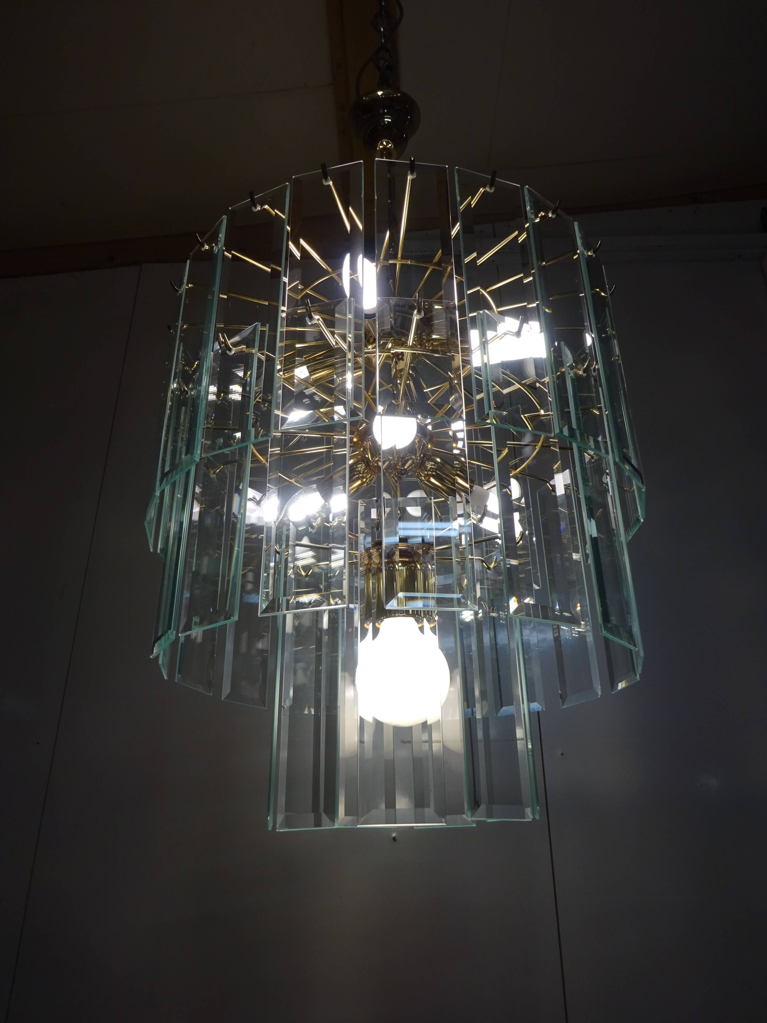 Brass chandelier and beveled glass, Italian manufacturing