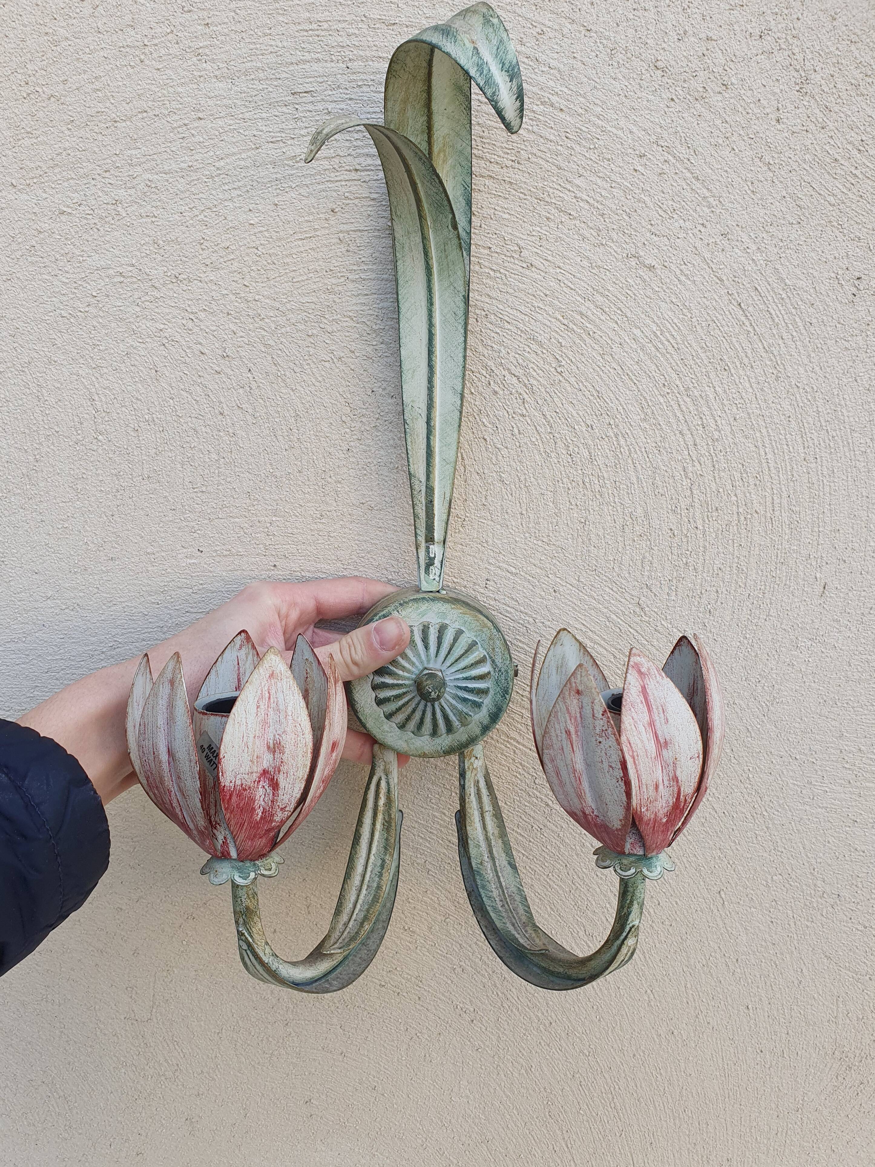 Pair of old sconces in painted sheet metal decorated with flowers