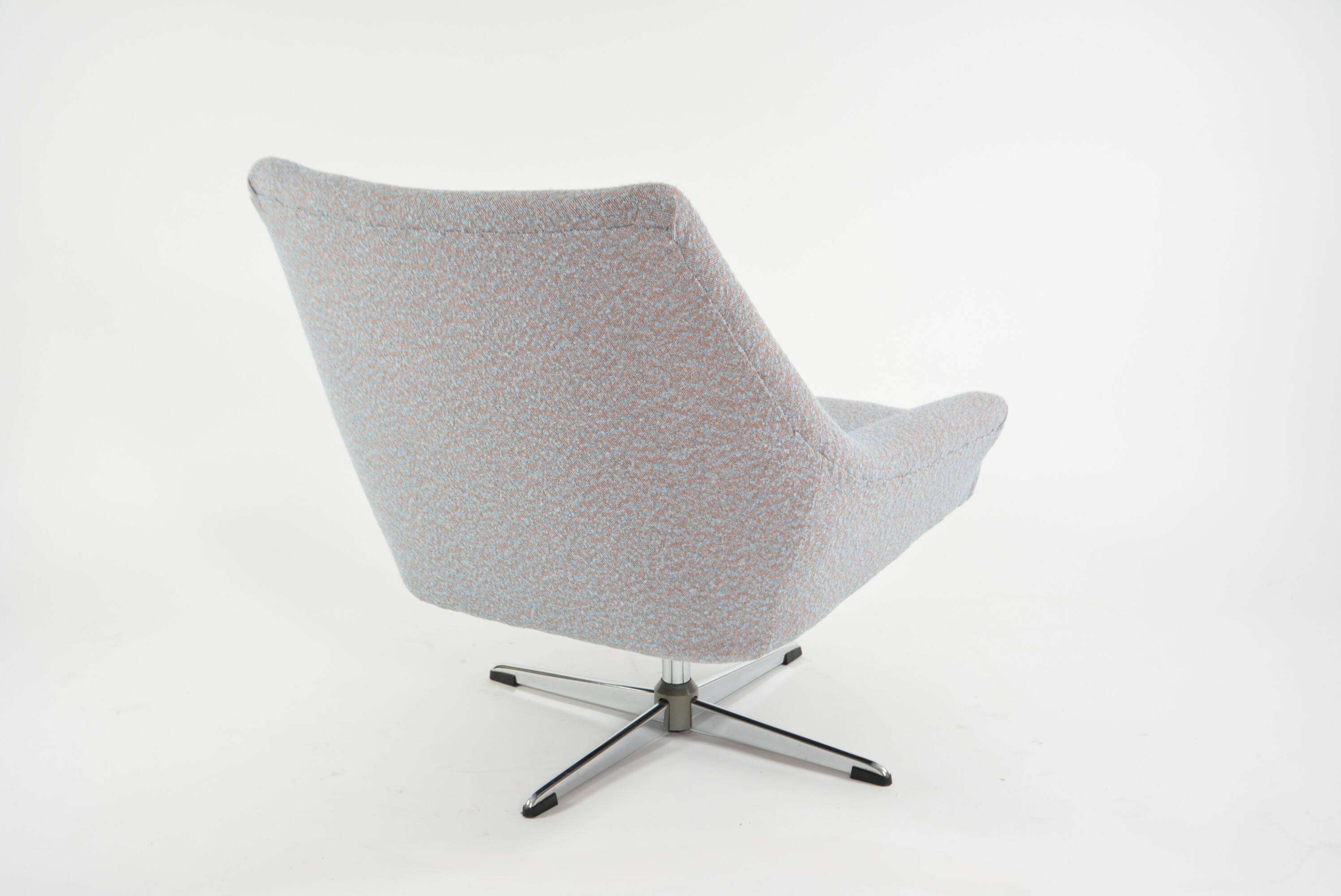 Modernist shell armchairs from the 1970s.