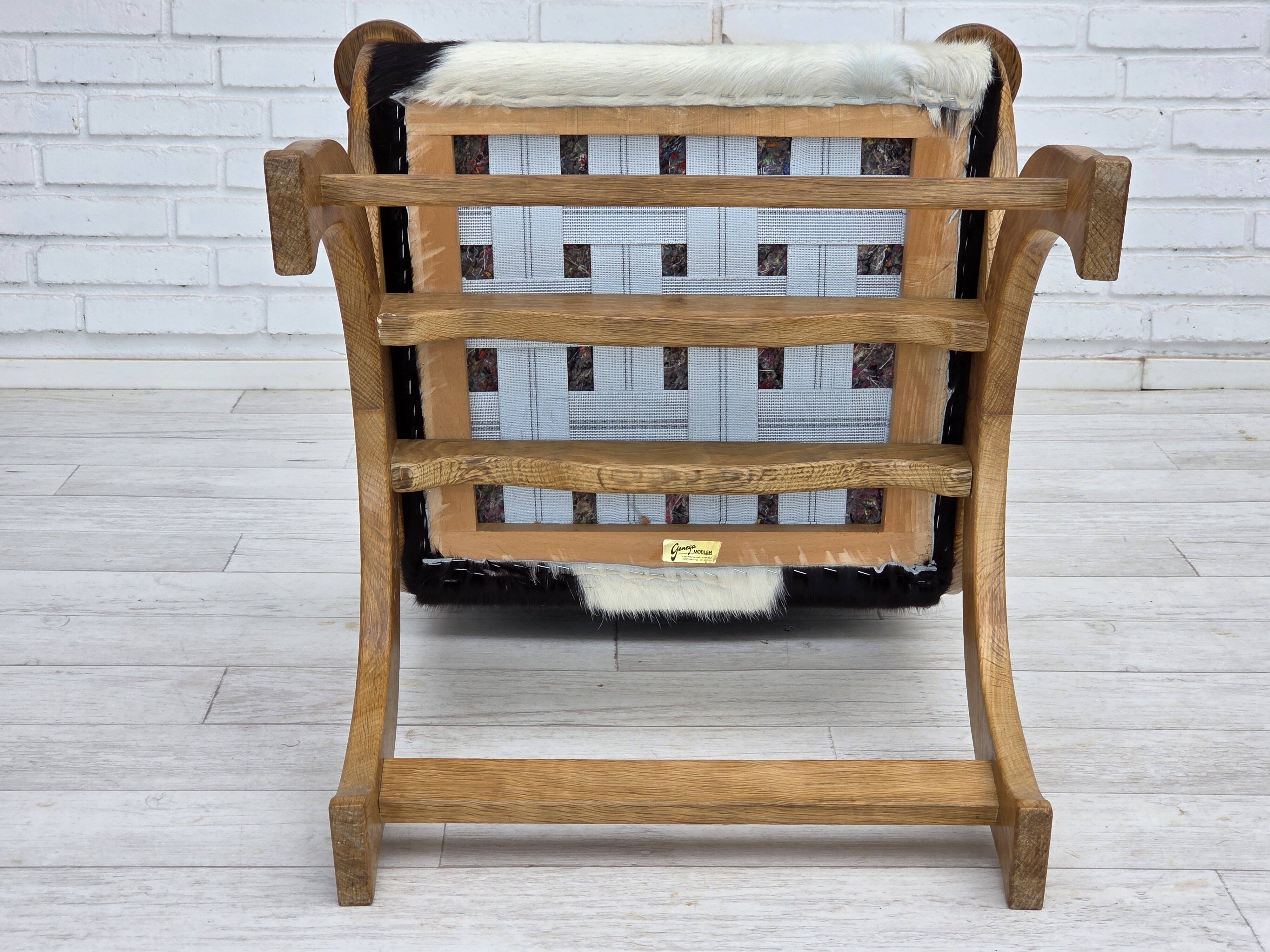 1960s, Danish highback armchair, genuine cowhide, oak wood, reupholstered.