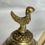 Brass dallah coffee pot with bird-shaped finial, 20th century.