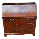 Secretary desk with a curved back in solid mahogany, 20th century.