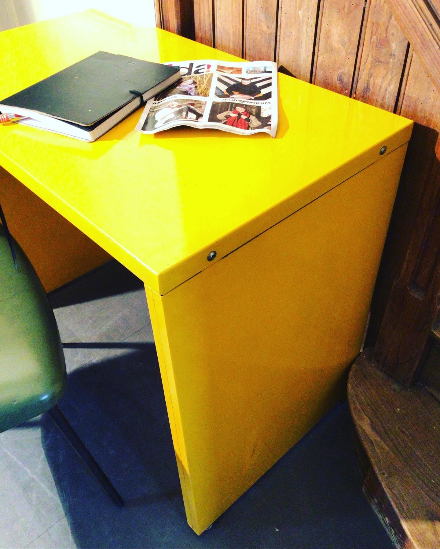 Small yellow metal desk