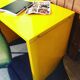 Small yellow metal desk