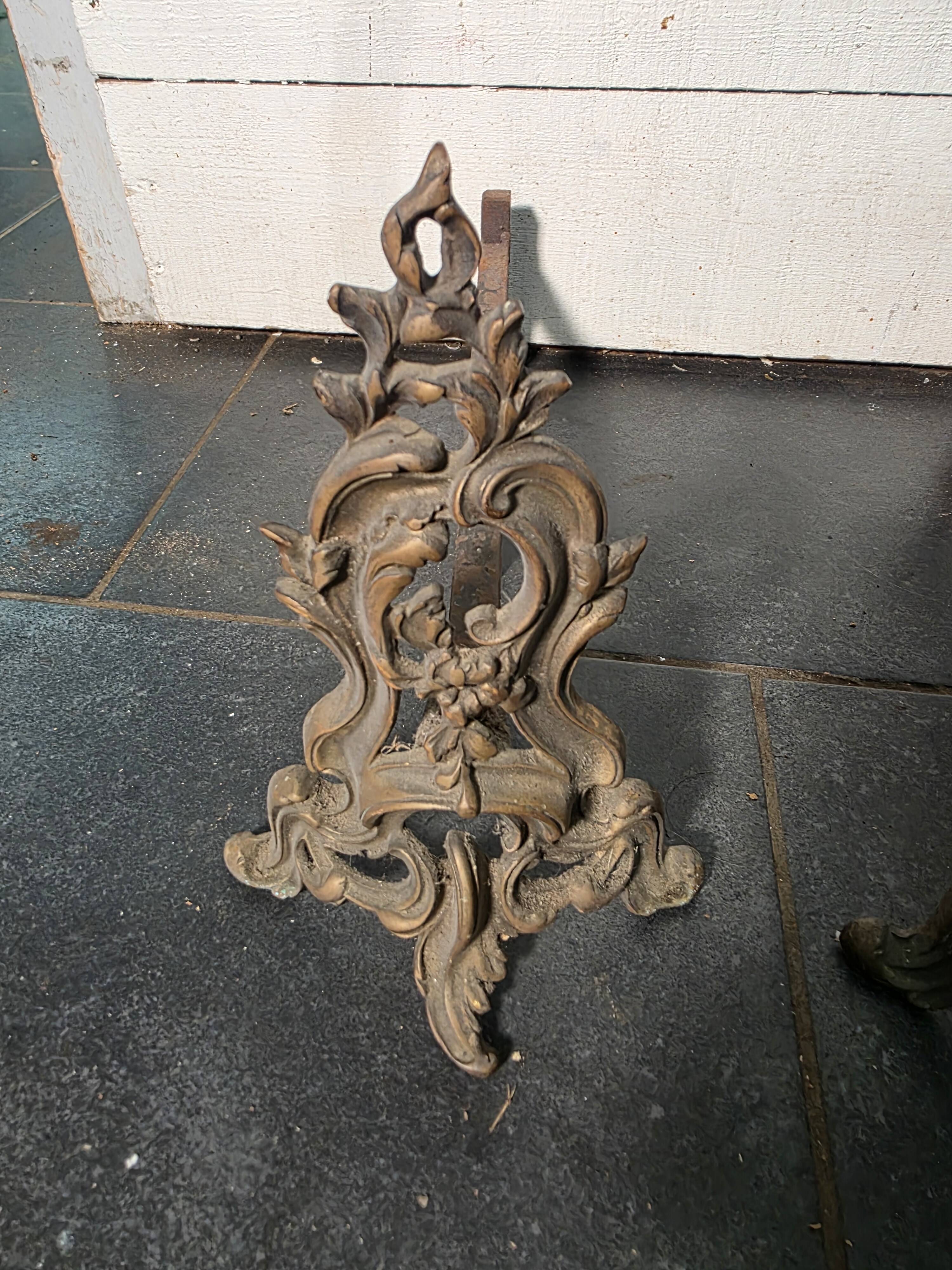 Pair of Louis XV style bronze andirons