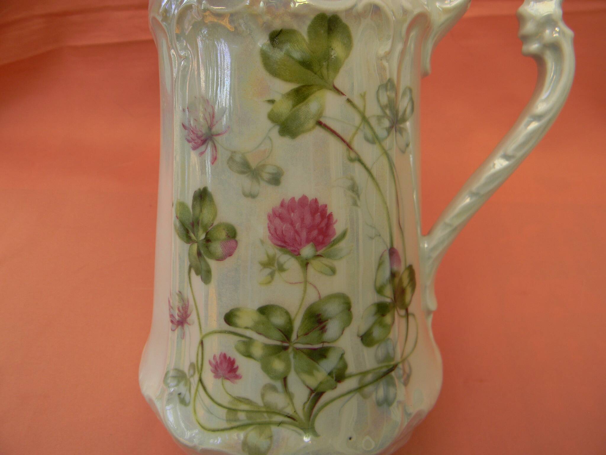 Art Nouveau pitcher in German porcelain.
