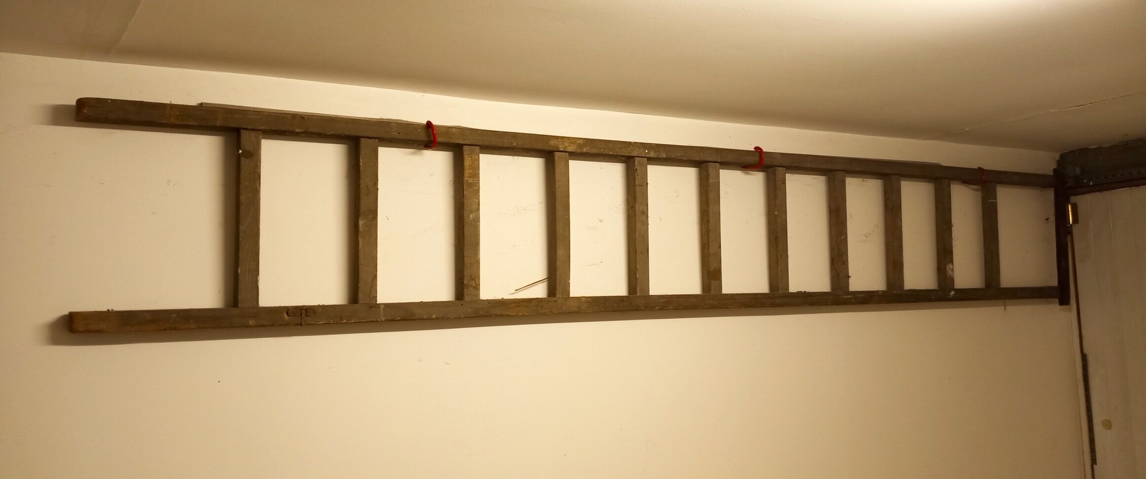 Old wooden flat roof ladder