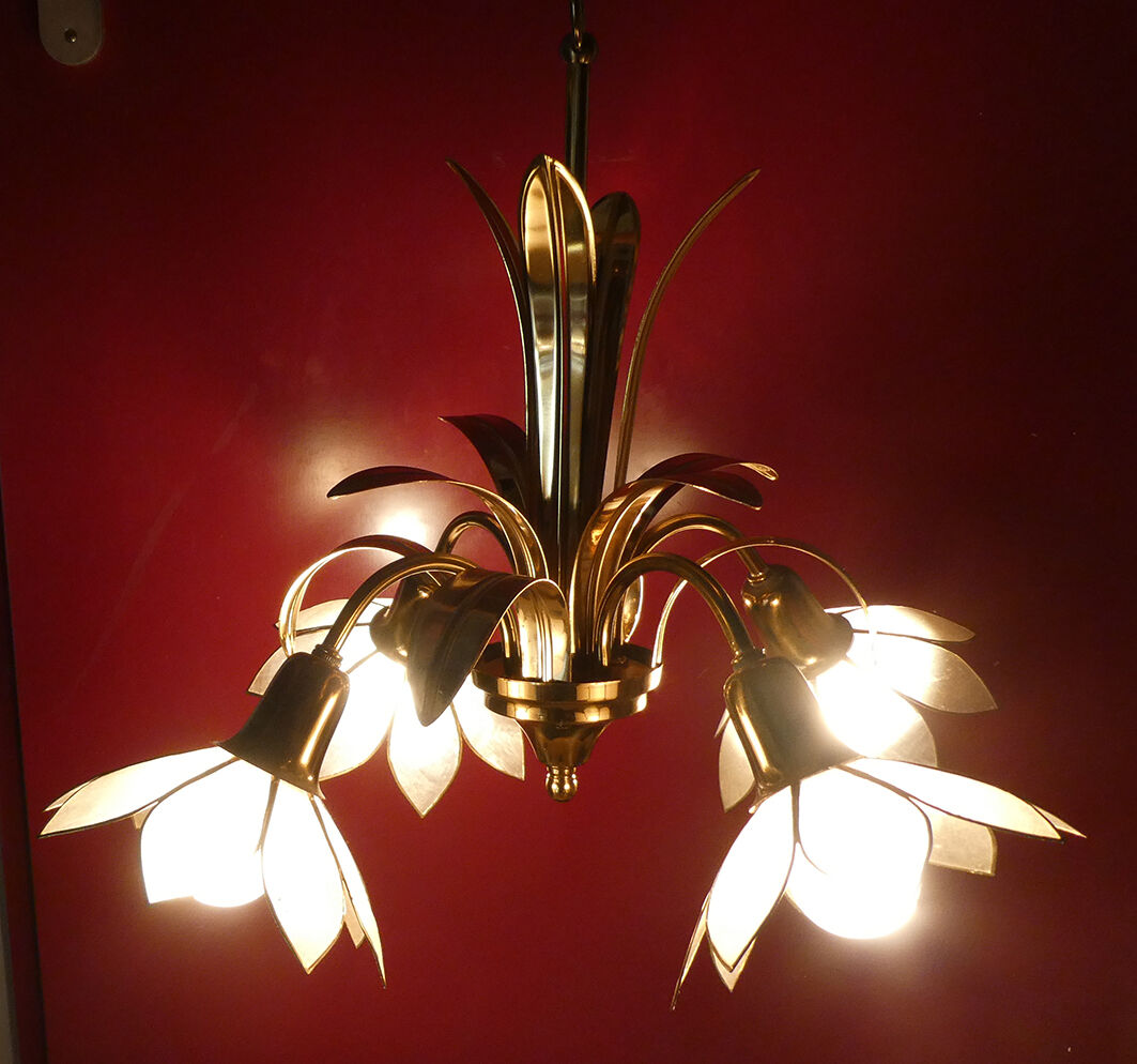 Brass chandelier and flowers in mother-of-pearl petals