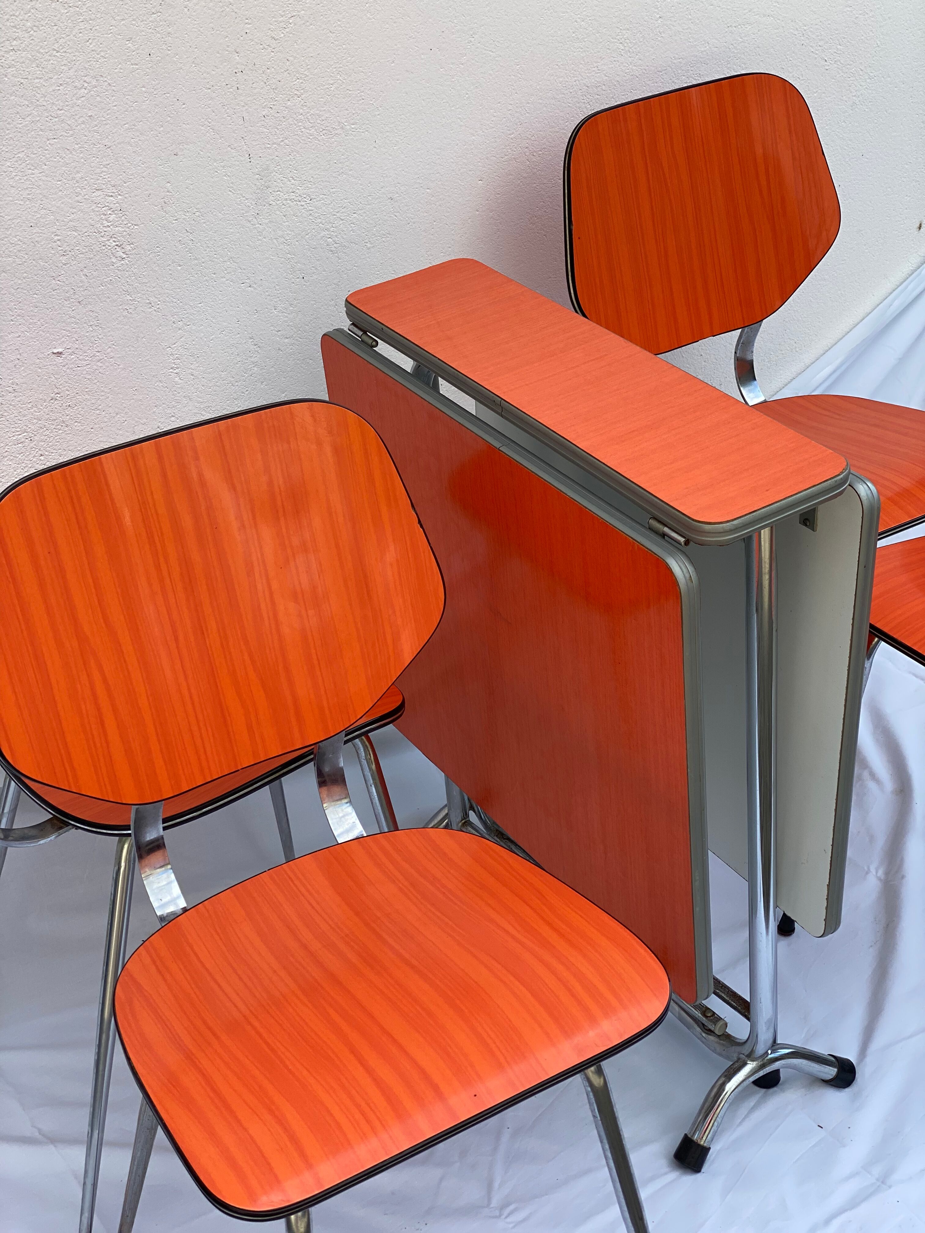 Orange formica table and 4 chairs