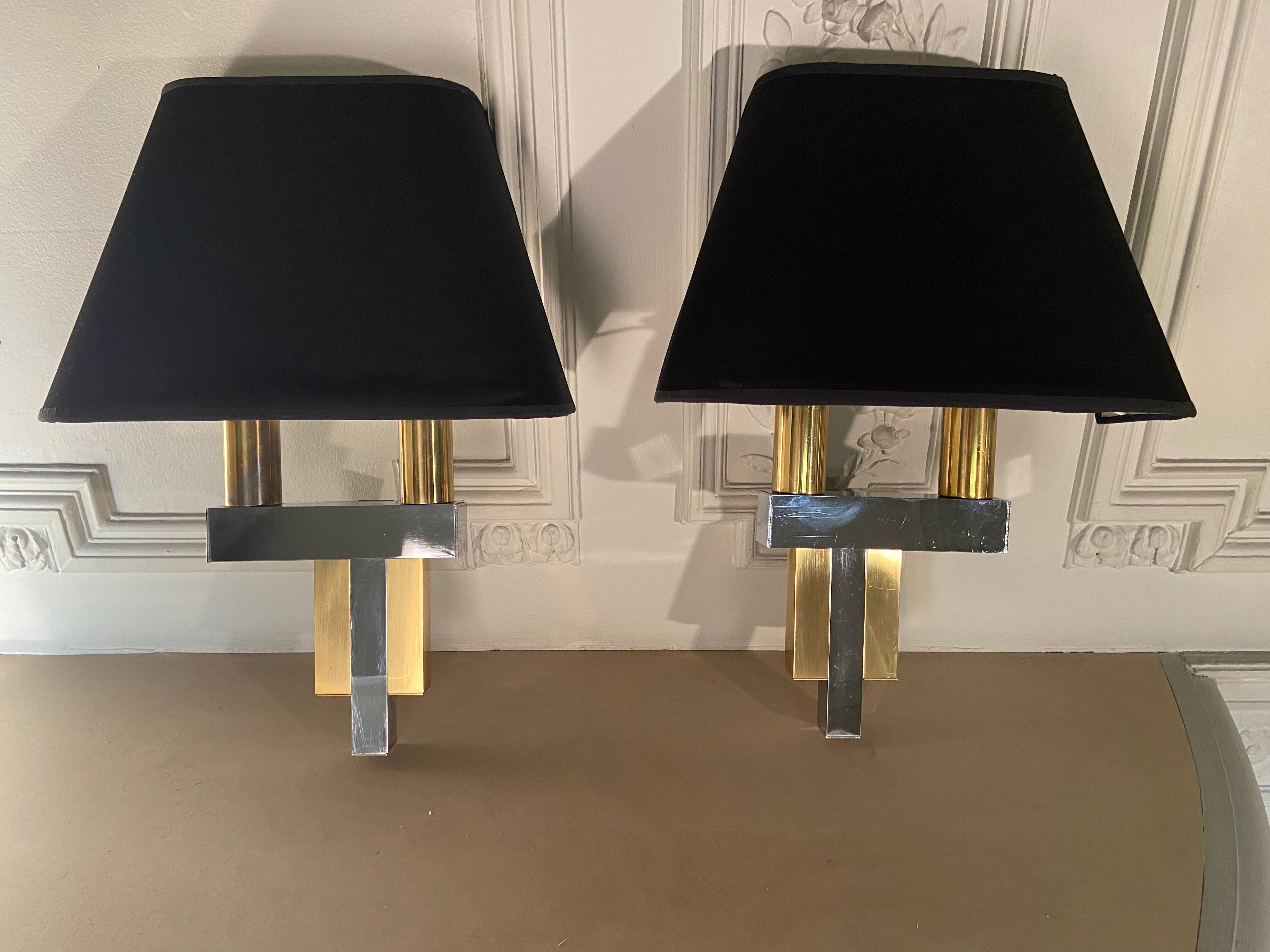 Pair of brass and chrome sconces