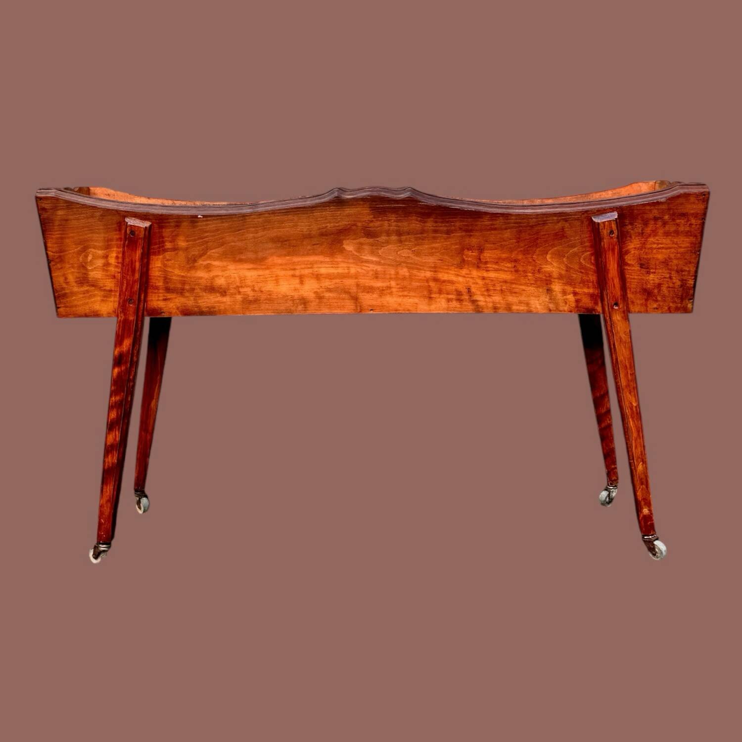 Old indoor planter on wheels