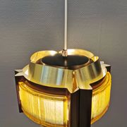 Danish hanging lamp, made in brass colored and brown metal, with yellowish hard pressed plastic deta