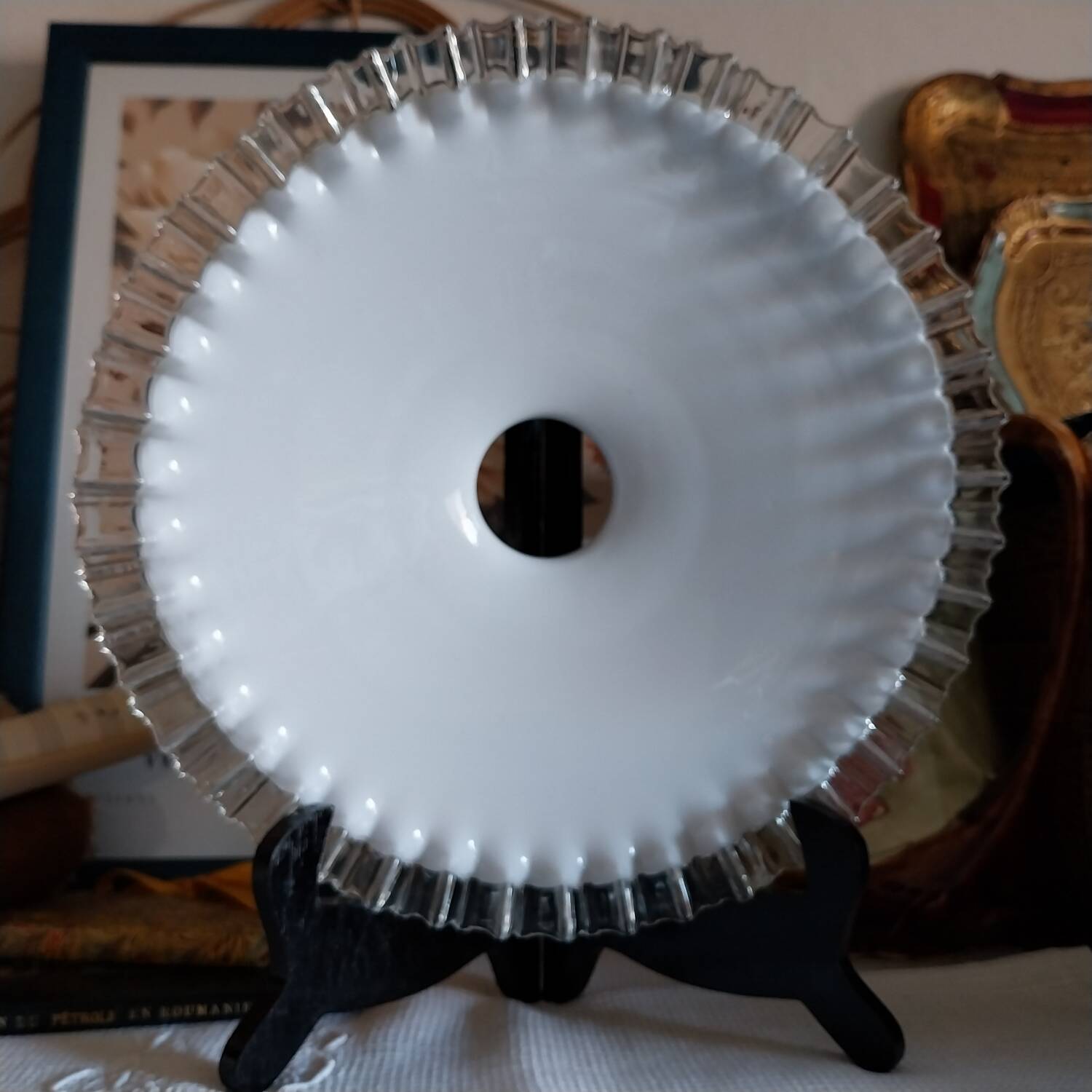 Old lace-edged conical lampshade in opaline