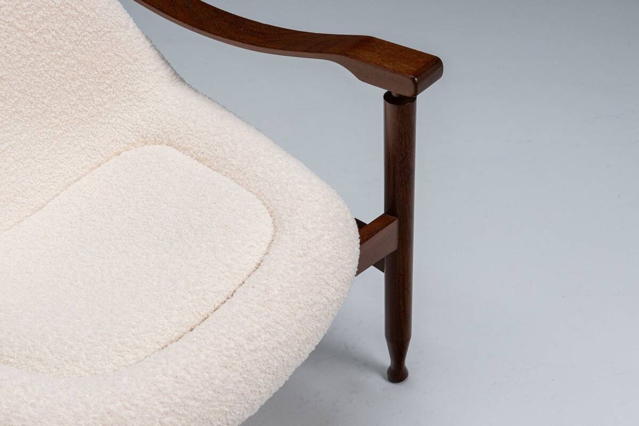 Pair of “Tiki” lounge chairs in teak and bouclé Busnelli Italy 1960
