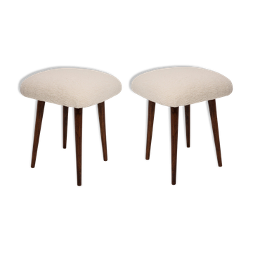 Set of two mid-century modern light beige boucle stools, Europe, 1960s.