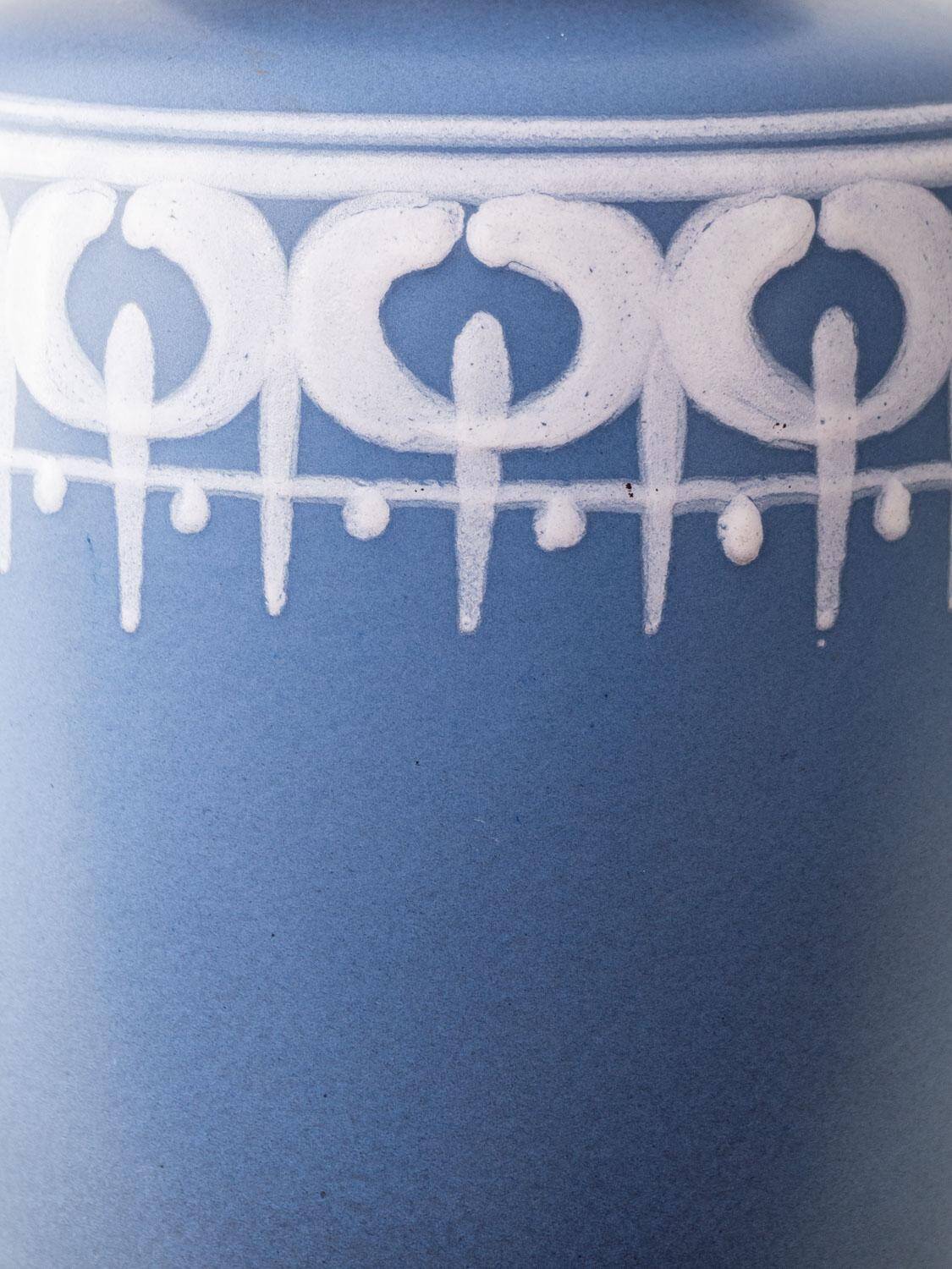 Mid-century modern blue ceramic table lamp with new Liberty London floral shade.