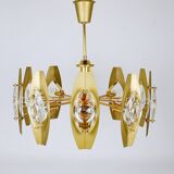 Oscar Torlasco brass chandelier of 25 inches with optical prism lenses, Italy, 1970s.