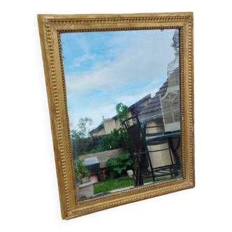 Miroir ancien en bois doré Louis XVI