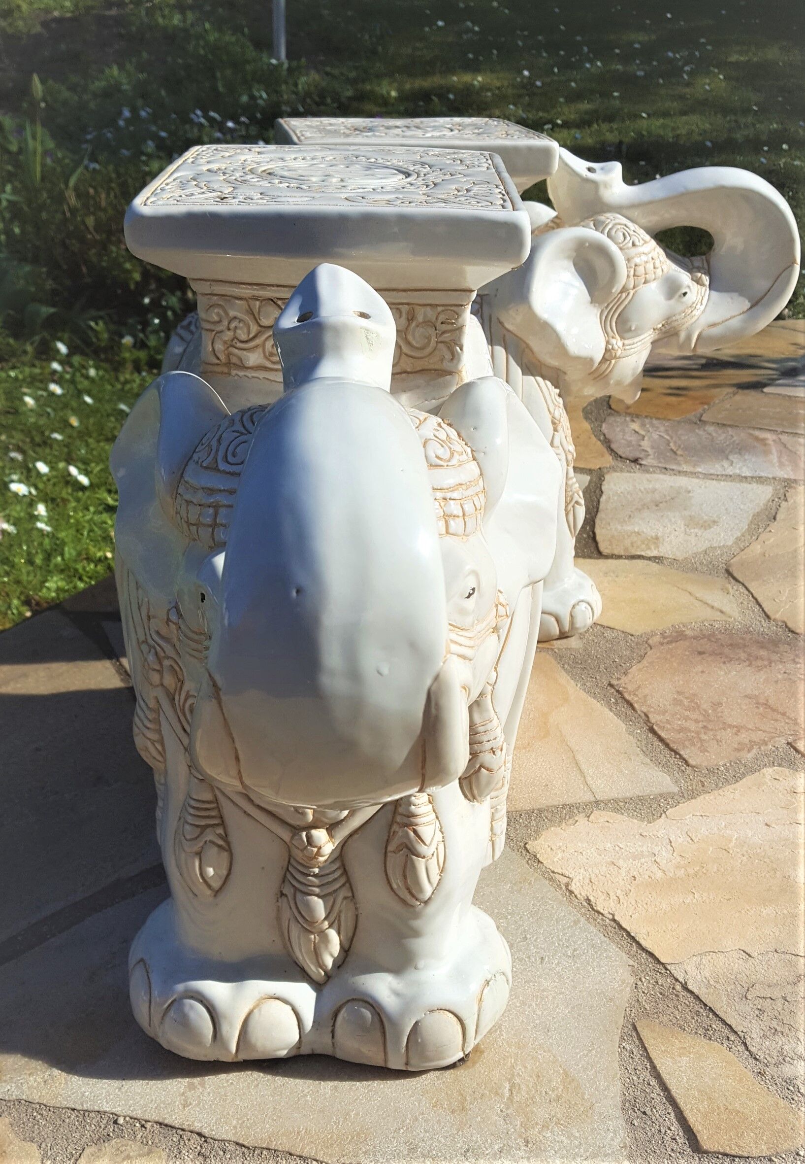 Pair of enamelled white ceramic elephant harnesses