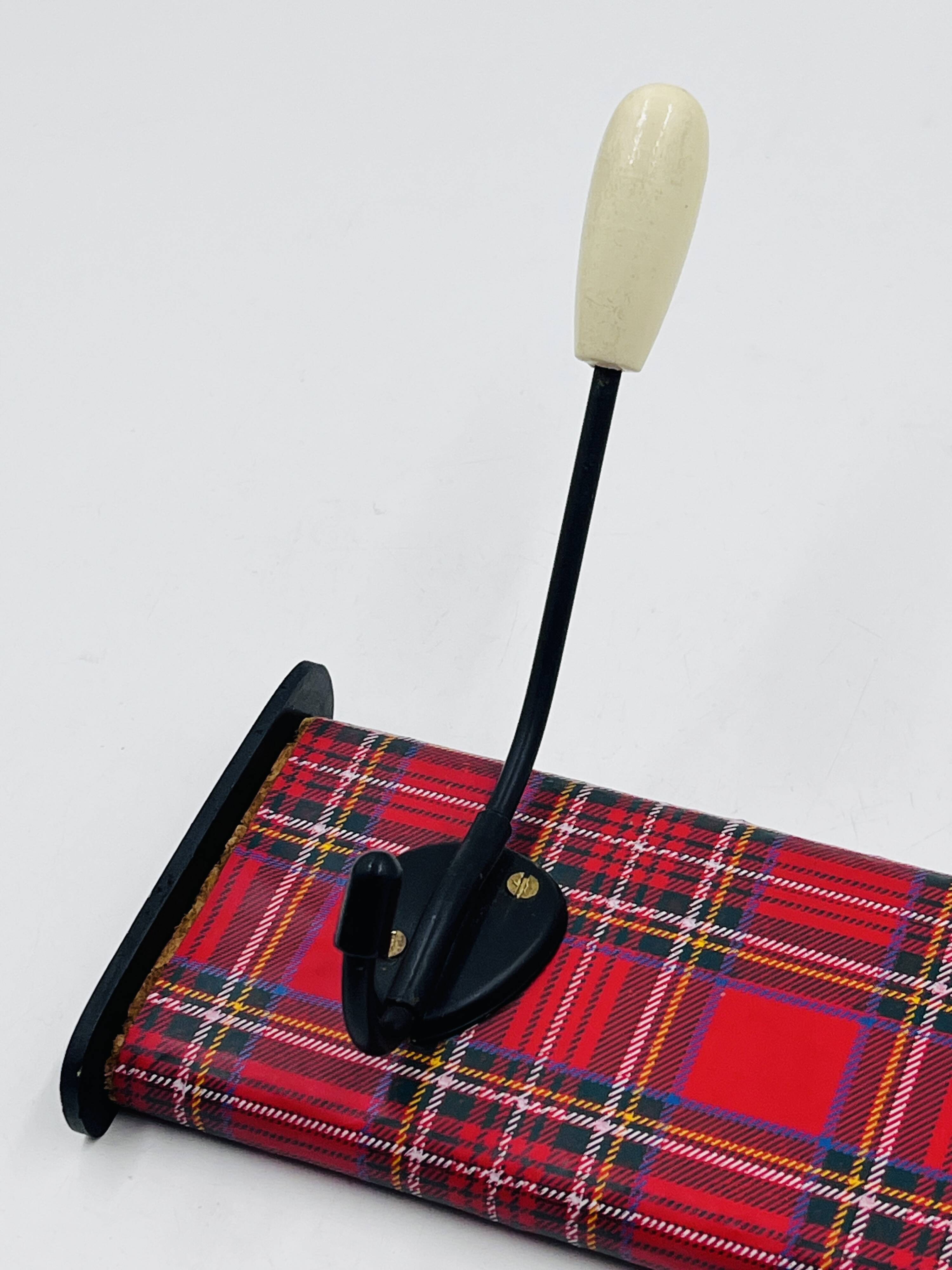 Vintage red Scottish coat rack from the 1970s.
