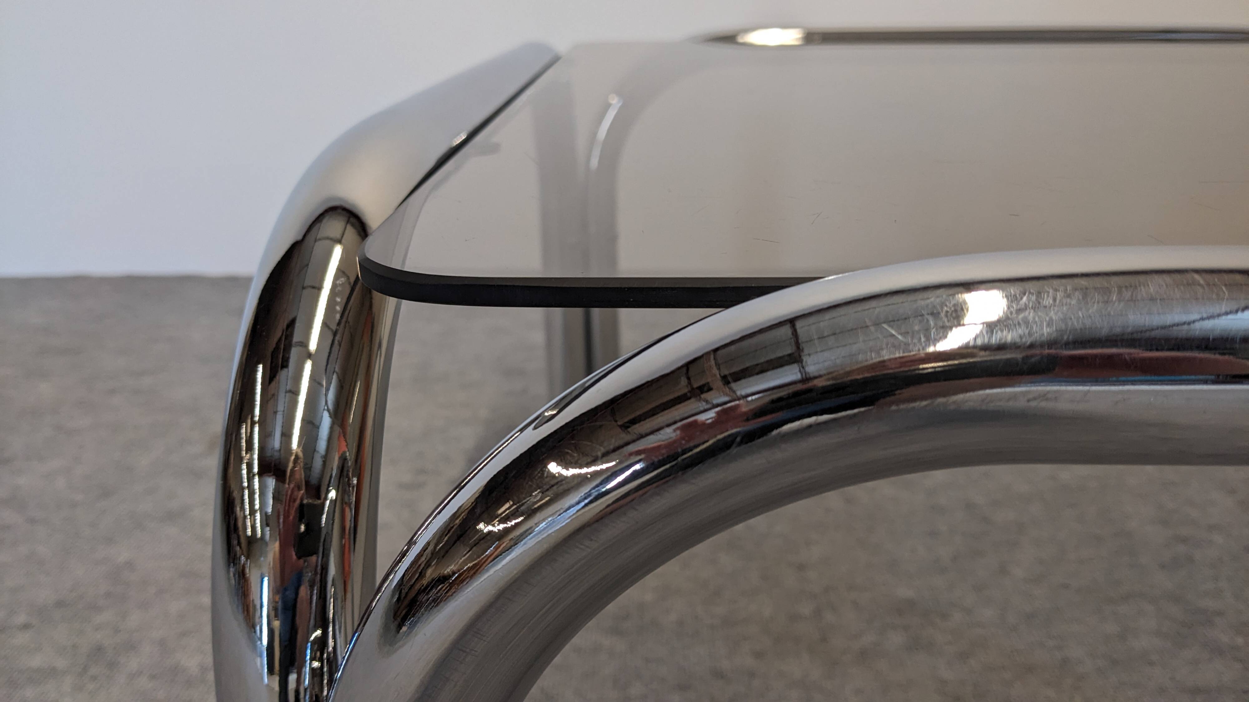 Space age tubular coffee table in smoked glass from the 60s/70s
