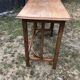 Old oak desk with curved wooden sleepers in the Art Nouveau spirit of the early 20th century.