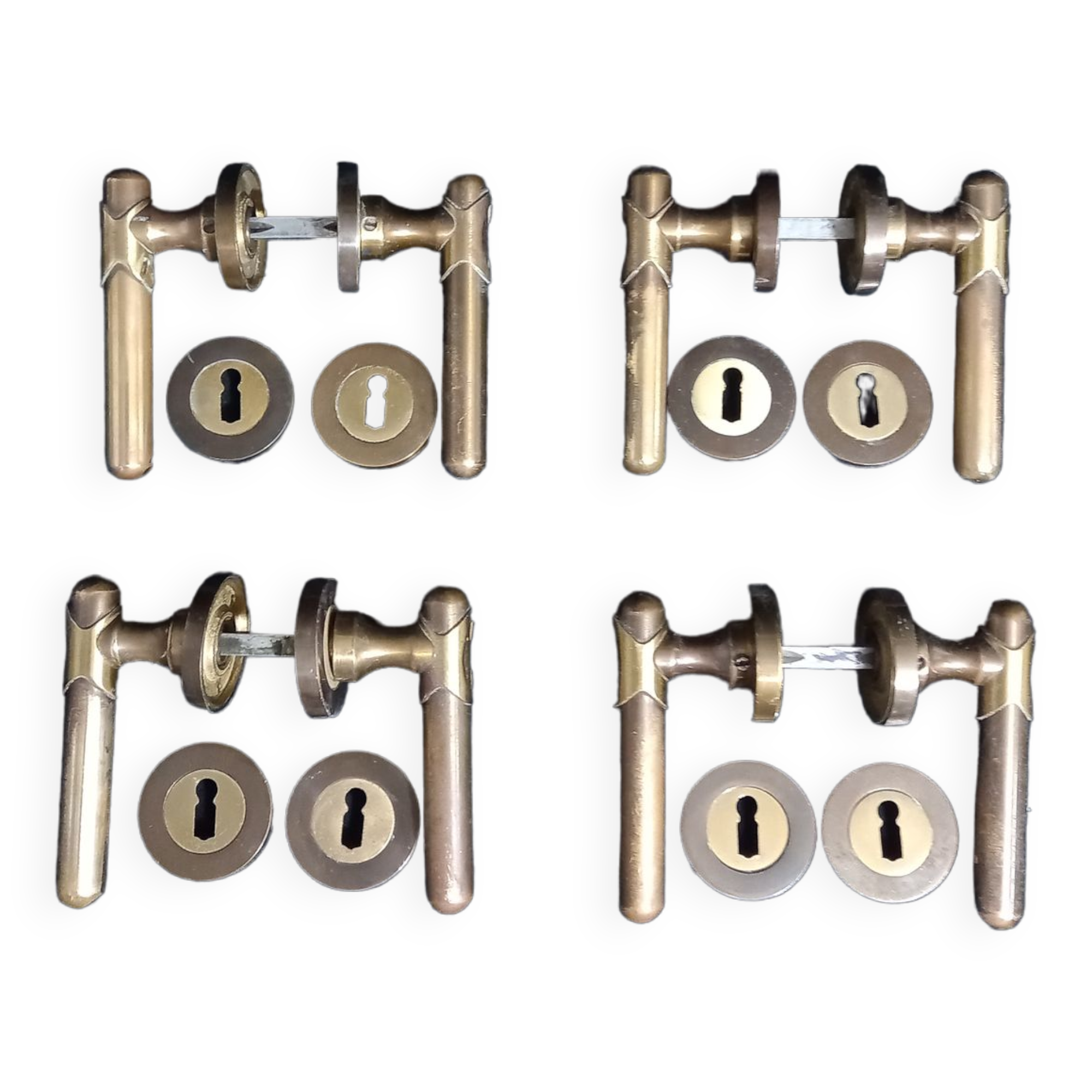 Four pairs of brass door handles with key plates