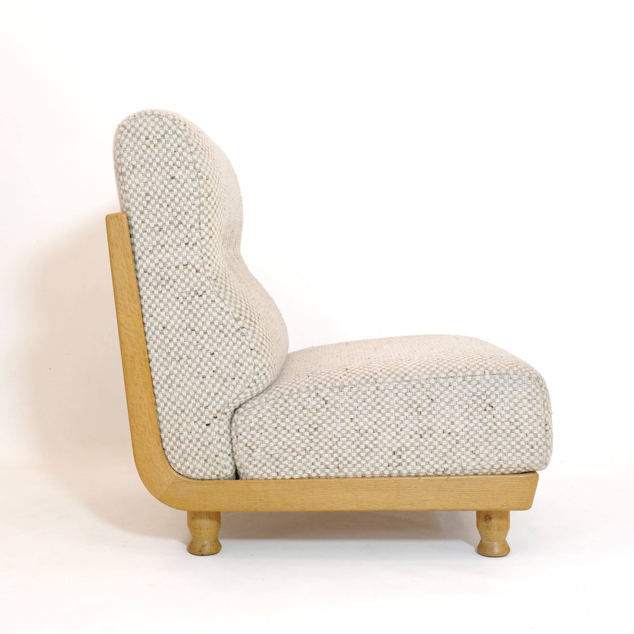Robert Guillerme & Jacques Chambron, armchair upholstered in beige fabric.