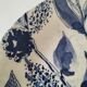 Two flat plates in earthenware with blue floral decoration.