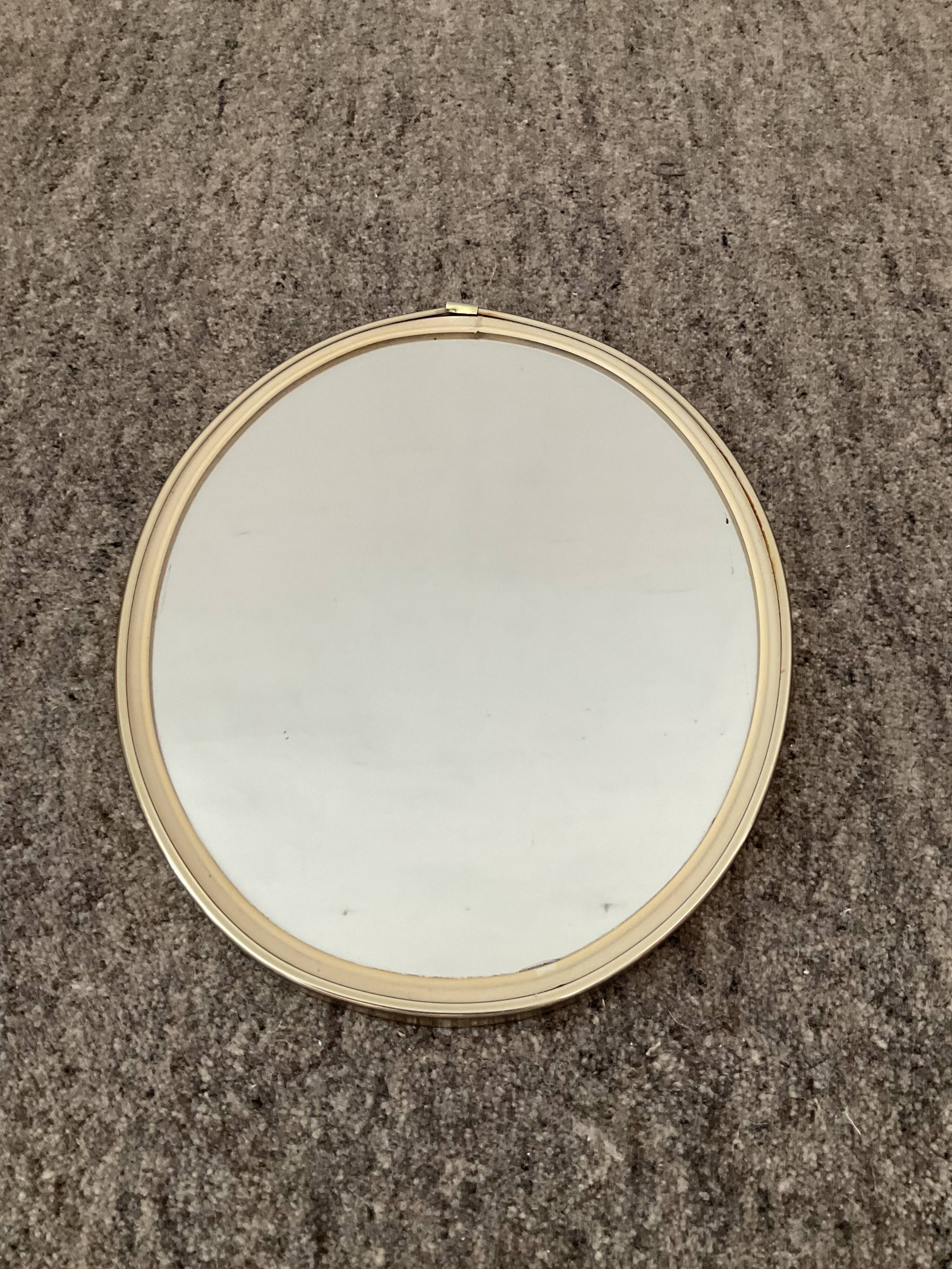 Vintage oval mirror from the 60s and 70s