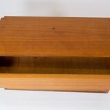 Wall mounted cabinet in teak of danish design from the 1960s.