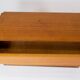 Wall mounted cabinet in teak of danish design from the 1960s.