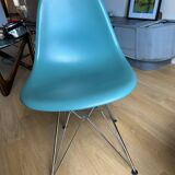 4 Eames chairs in turquoise blue color