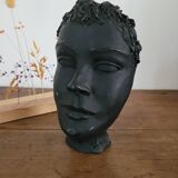 Black ceramic face sculpture